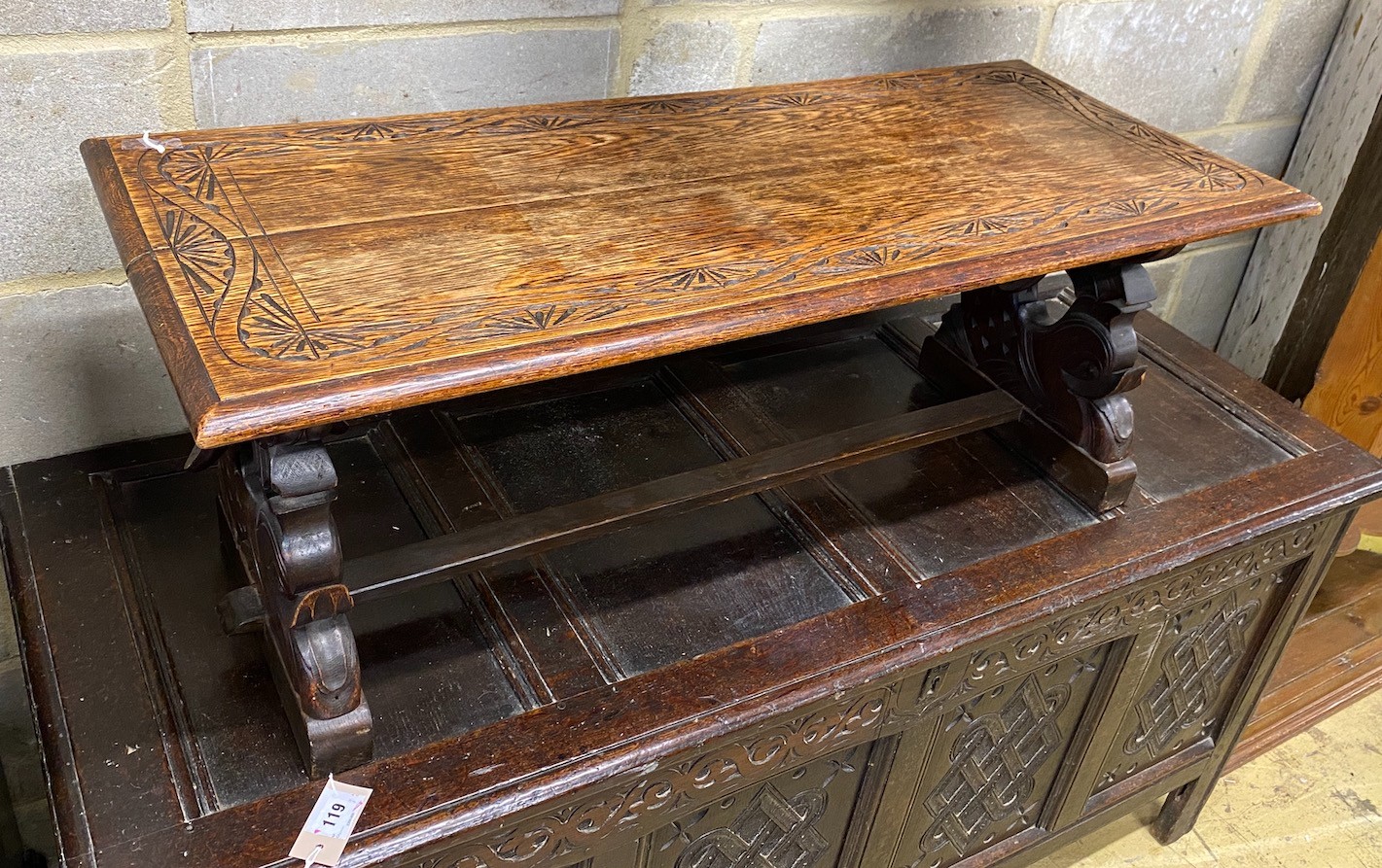 A rectangular carved oak coffee table, length 104cm, depth 44cm, height 39cm